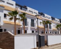 Attached townhouse with palmtrees - Modern attached house for sale with community pool and garage in Jesus Pobre