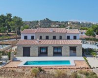 Grote finca met zwembad en tuin - Nieuwbouw finca stijl villa met prachtig uitzicht op zee te koop in Benissa