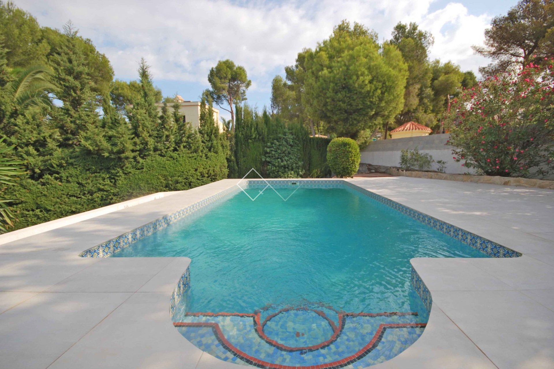 piscina turquesa - ​Muy bonita villa en venta en San Jaime, Benissa