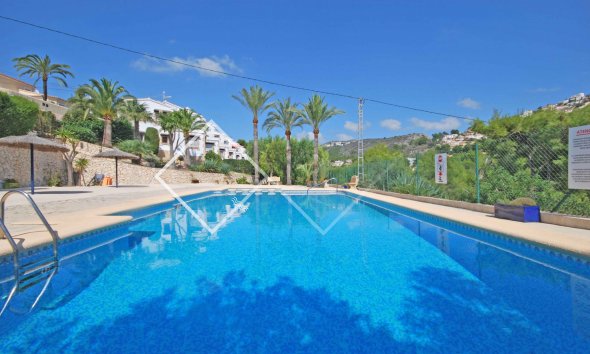 piscina comunitaria - Chalet adosado en venta cerca de El Portet, Moraira