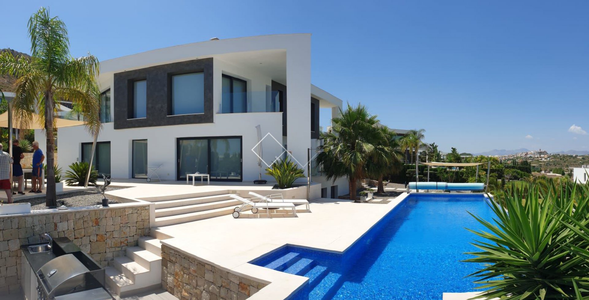-zwembad en huis luxe en moderne villa met zwembad en zeezicht in Javea