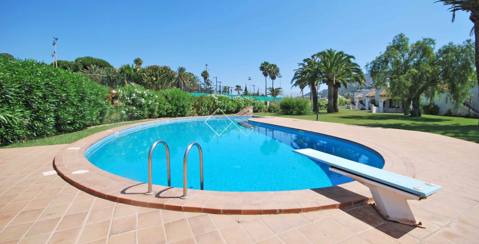 gemeenschappelijk zwembad - ​Mooie geschakelde woning te koop in Solpark, Moraira