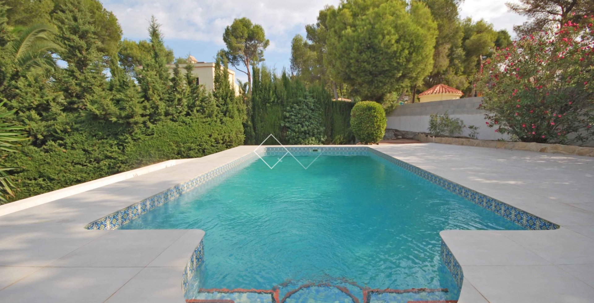 piscina turquesa - ​Muy bonita villa en venta en San Jaime, Benissa