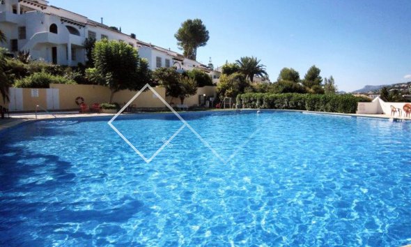 community pool - Apartment with tourist licence for sale in Villotel, Moraira