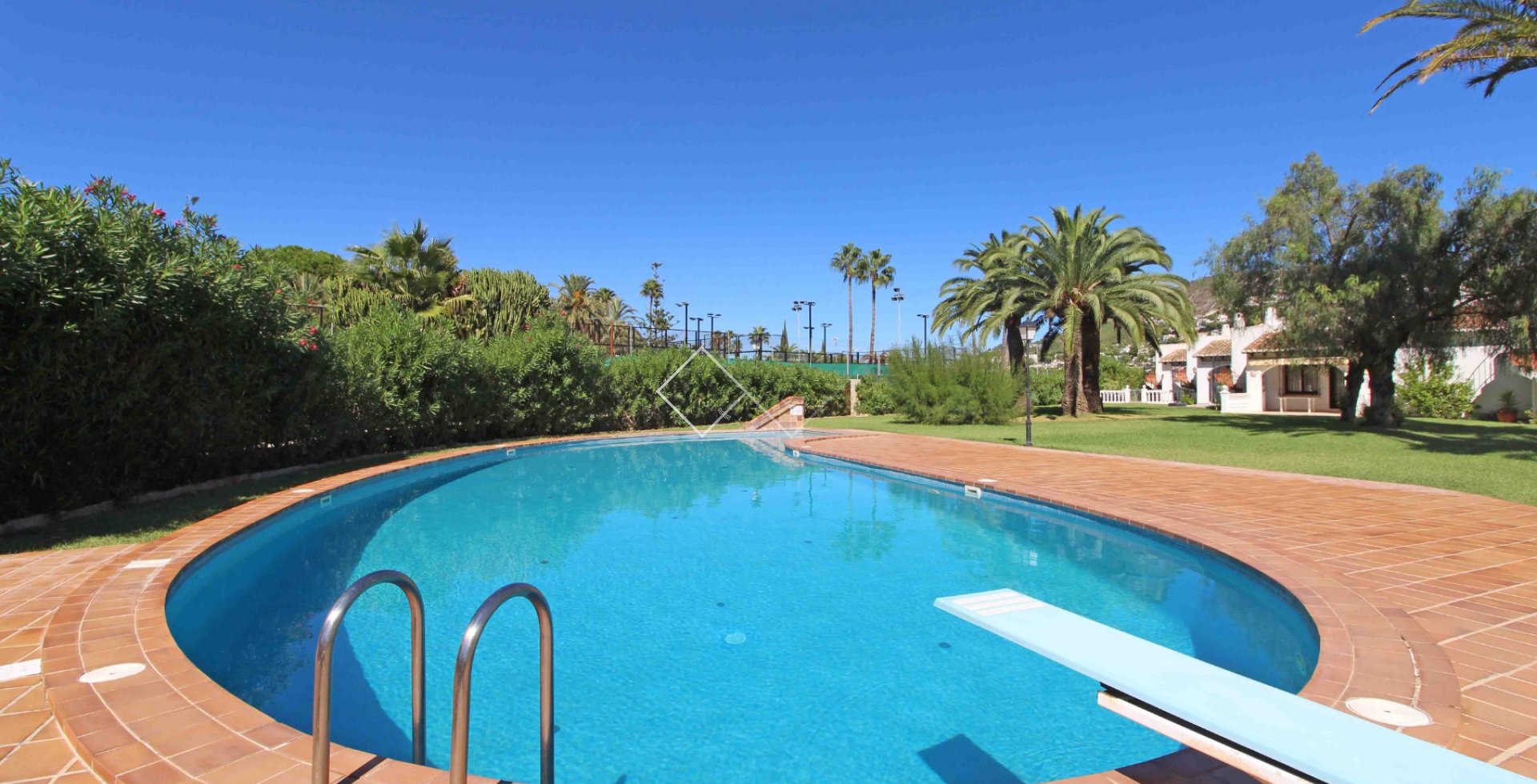 communal pool - Well maintained attached villa for sale close to Moraira
