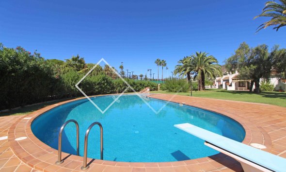 communal pool - Well maintained attached villa for sale close to Moraira